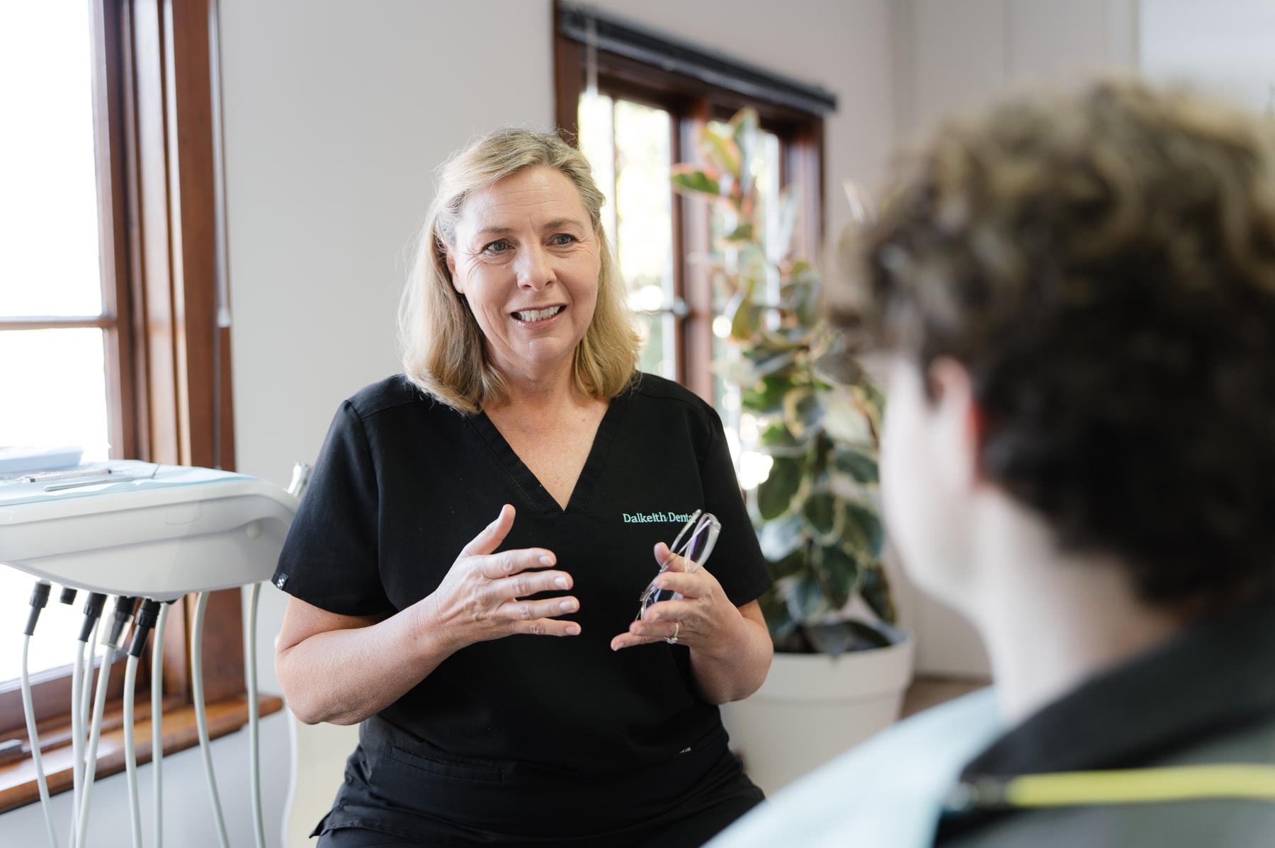 Dalkeith Dental team member discussing care options with a patient