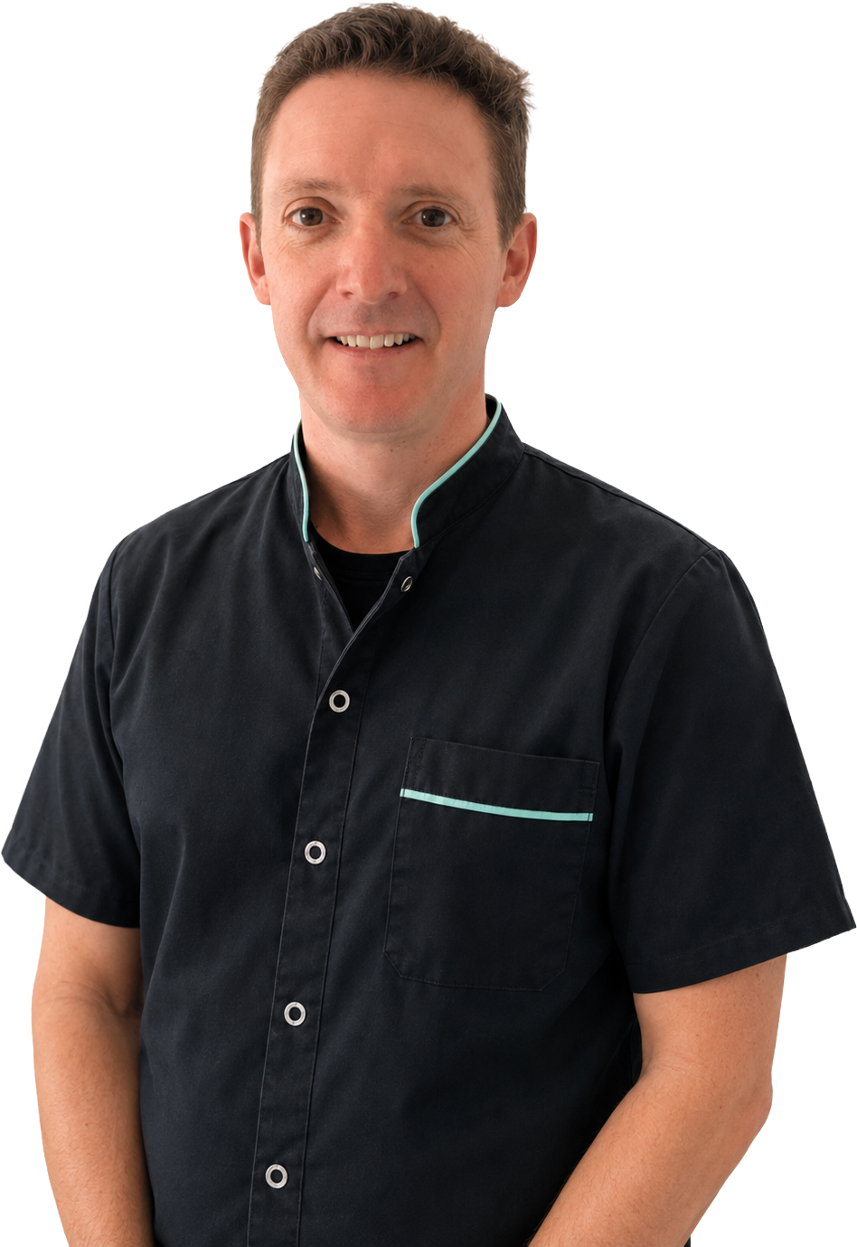 Dr Jeremy Gray smiling in a white dental coat